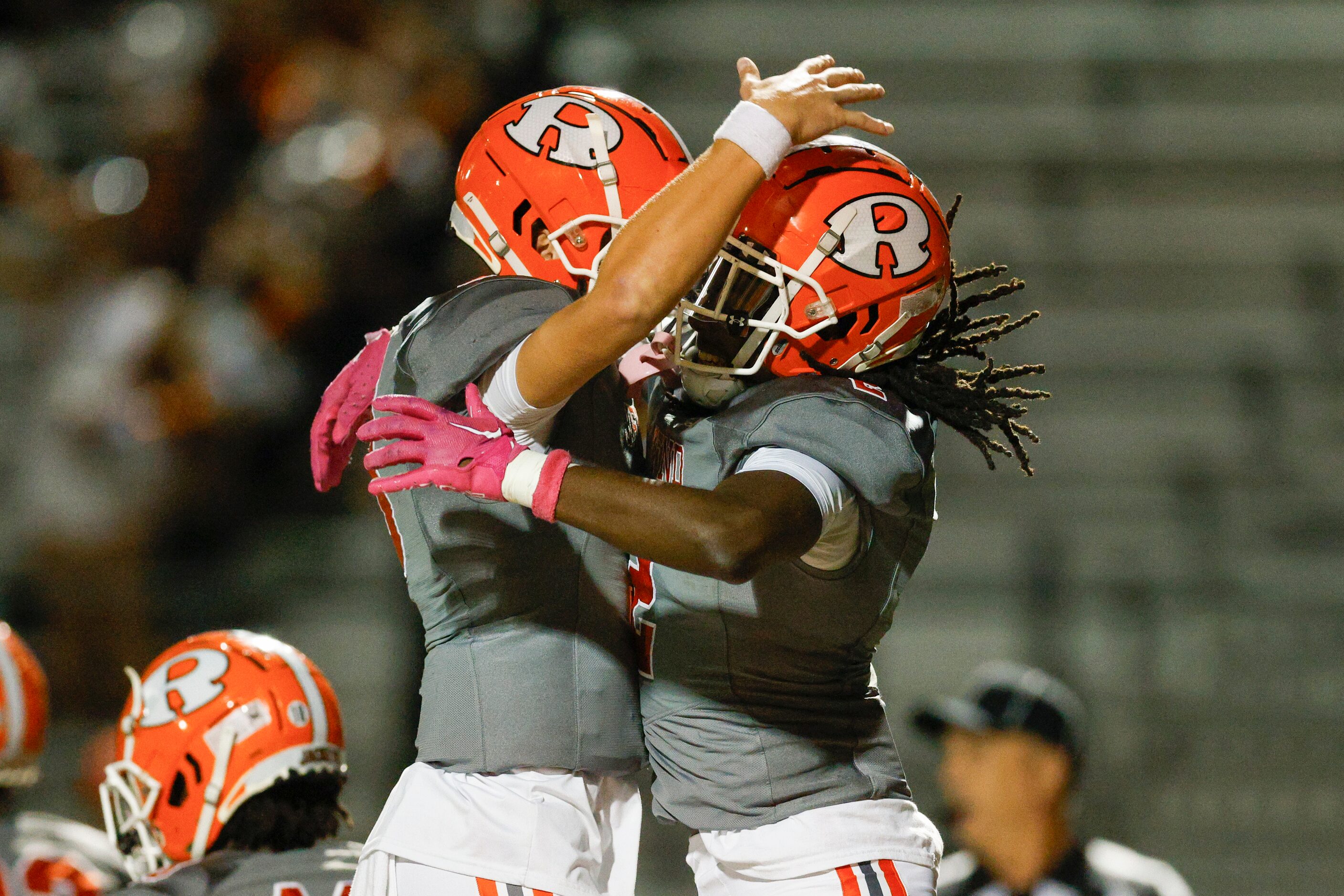 Rockwall quarterback Landyn Locke (3) celebrates a touchdown with running back Ashten Emory...