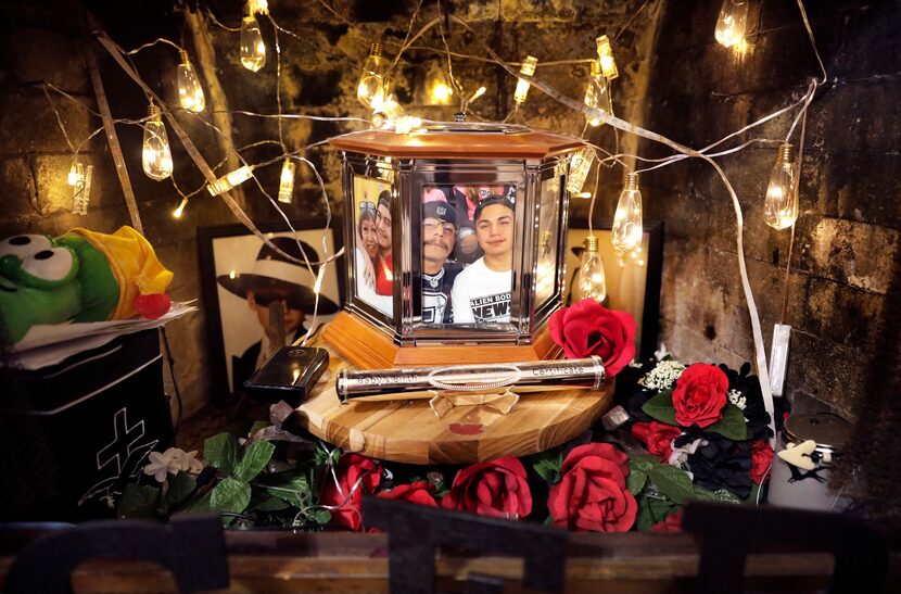 Ofie and Frank Moreno’s fireplace in their Fort Worth home is a makeshift grotto filled with...