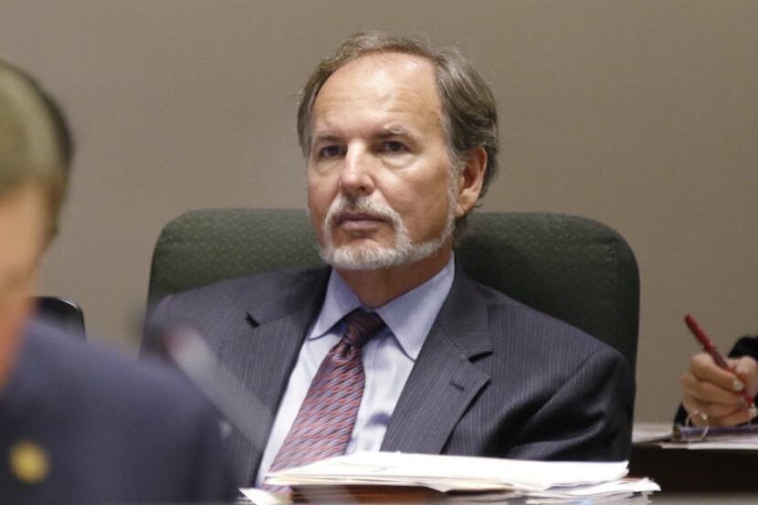 Dallas City Attorney Warren Ernst, 61, announced his retirement to the City Council during a...