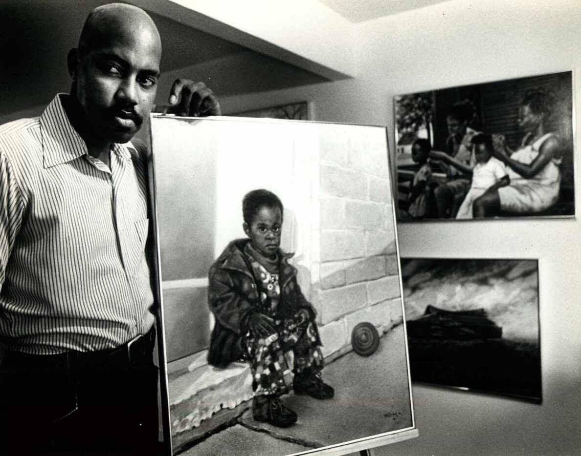 Arthello Beck Jr. posed with a portrait of his son in 1979.