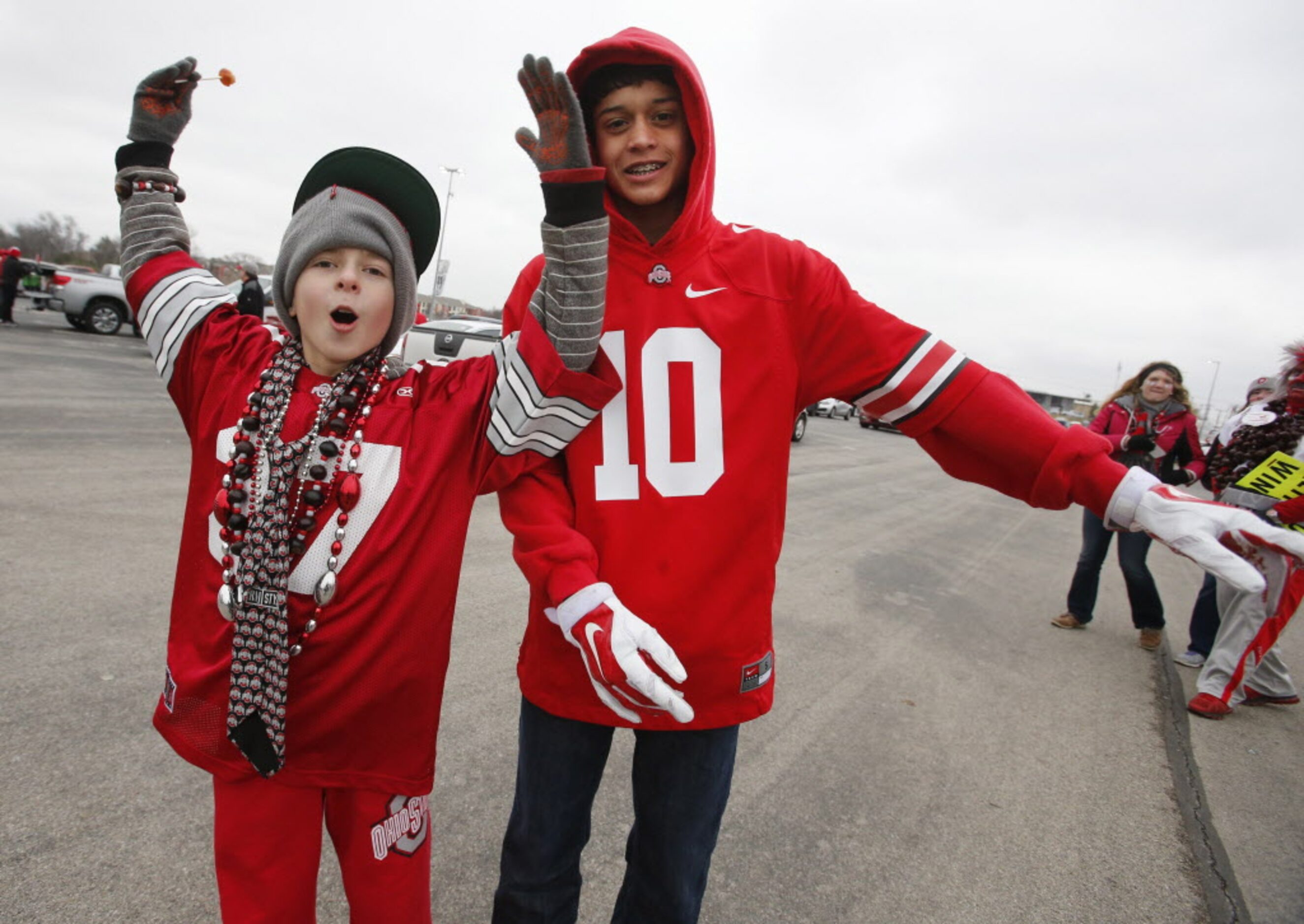 Simon DiSabato and Ben Eddlevlute get excited about the upcoming game as they tailgate...