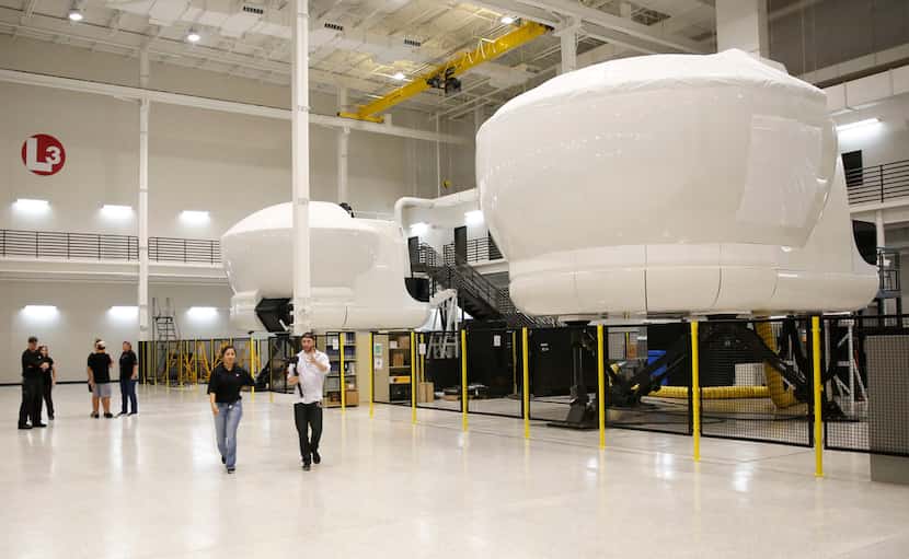Flight simulators at an L3 Technologies training center in Arlington on Saturday, October 6,...