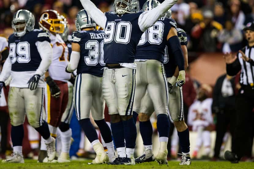 Dallas Cowboys defensive end Demarcus Lawrence (90) celebrates after a tackle during the...