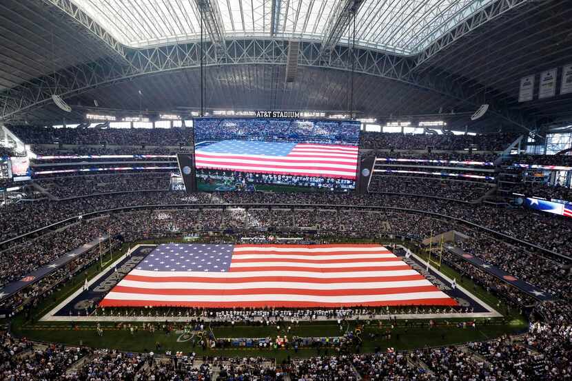 
A giant flag was unfurled during the national anthem before a Dallas Cowboys playoff game...