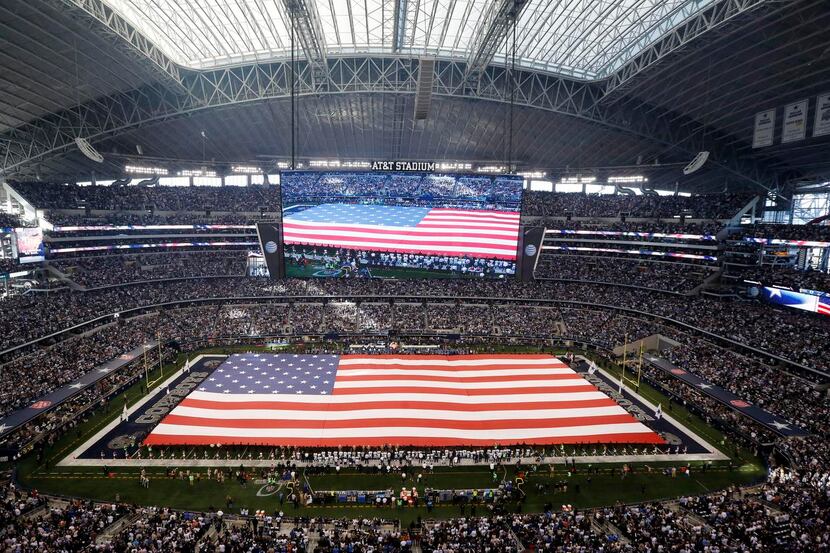 
A giant flag was unfurled during the national anthem before a Dallas Cowboys playoff game...