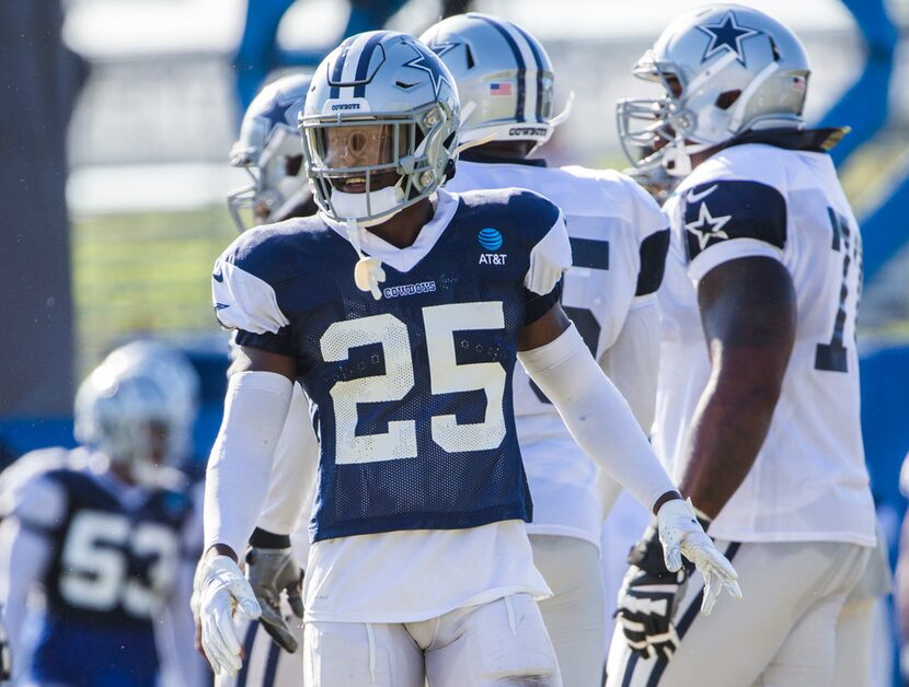 Dallas Cowboys free safety Xavier Woods (25) smiles during an afternoon practice at training...