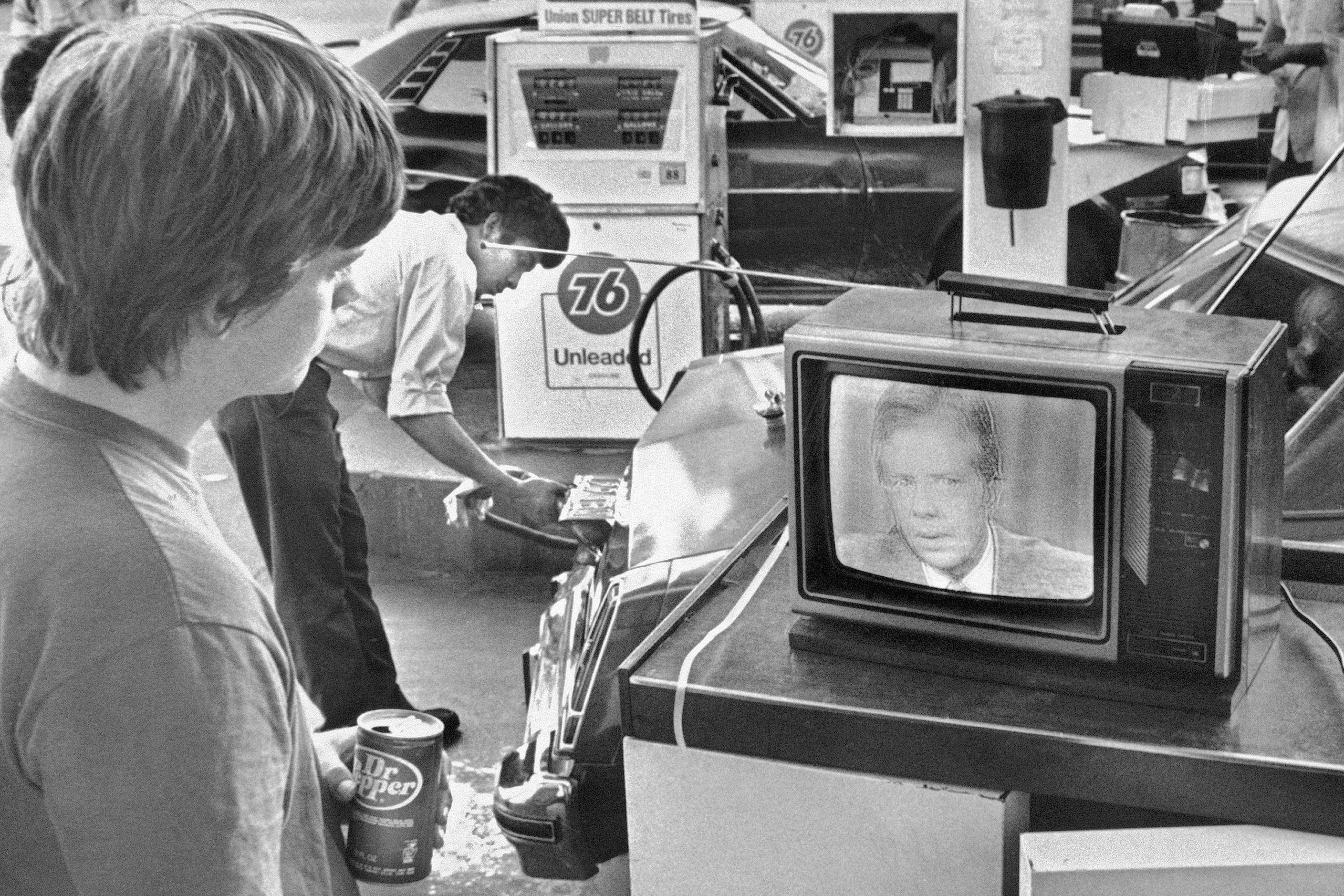 College student Chuck McManis watches President Jimmy Carter's nationally televised energy...