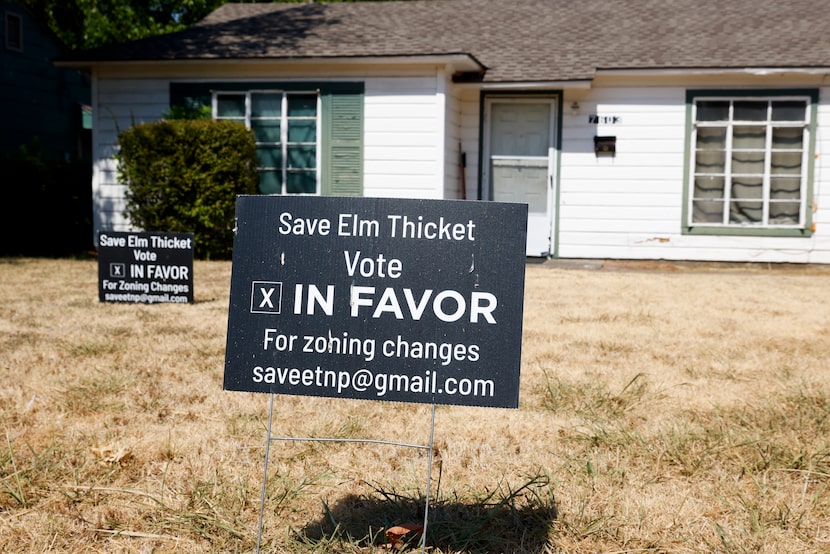 One of many older homes in the Elm Thicket-Northpark neighborhood in which front-yard signs...