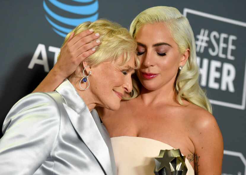Glenn Close, left, and Lady Gaga, winners in a tie for the best actress award at the 24th...