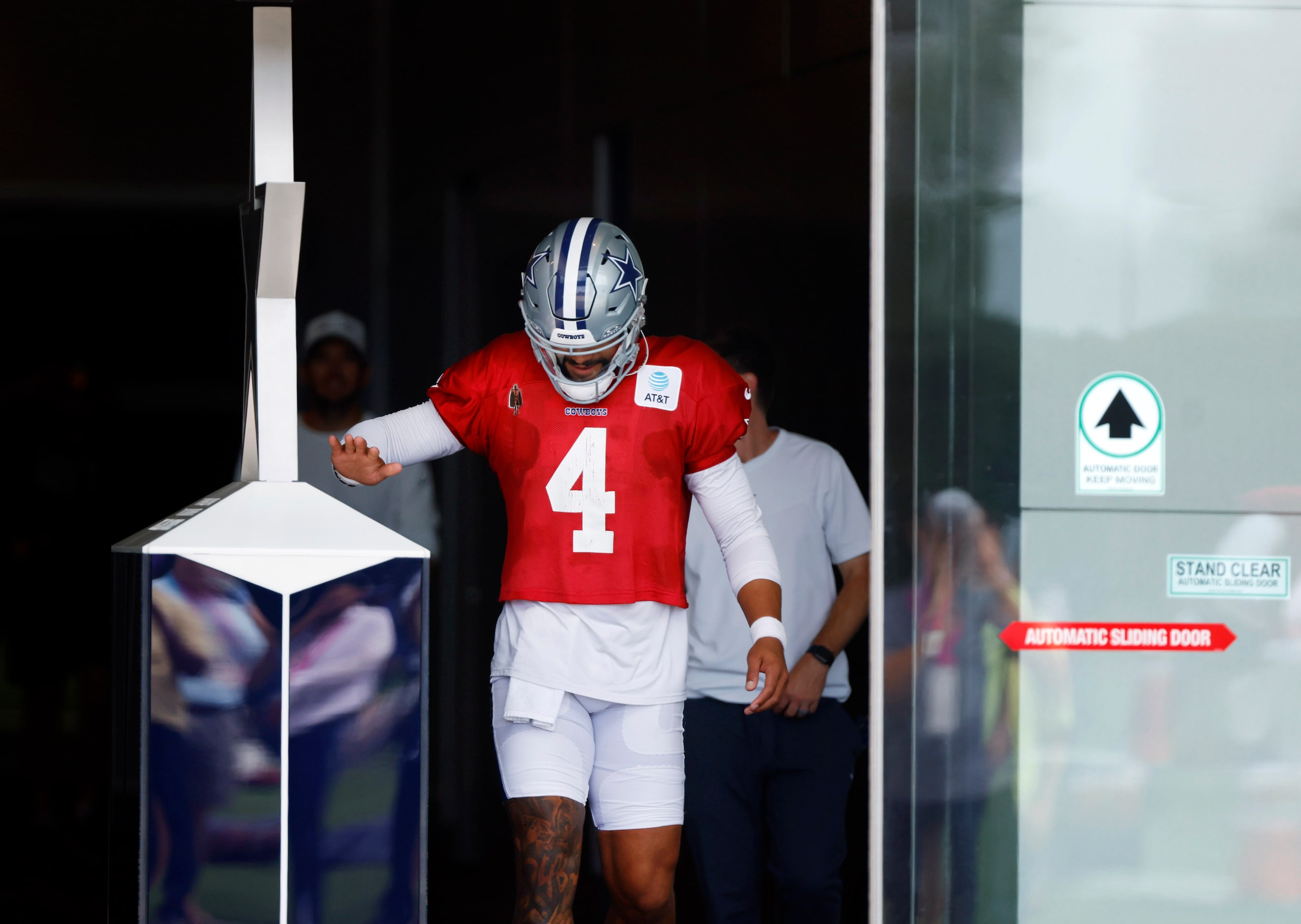 23Dallas Cowboys quarterback Dak Prescott (4) arrives for practice at The Star in Frisco,...