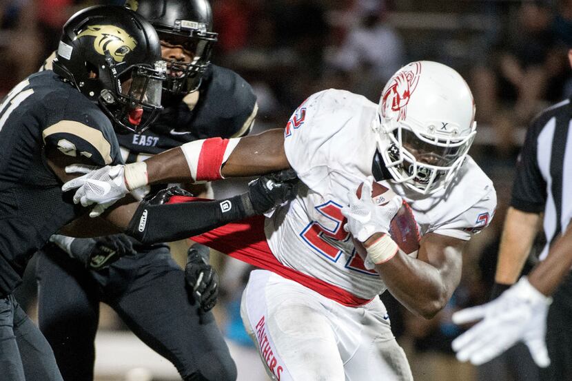 Star running back Keilon Elder (22) will try to lead Duncanville to a win next week over...