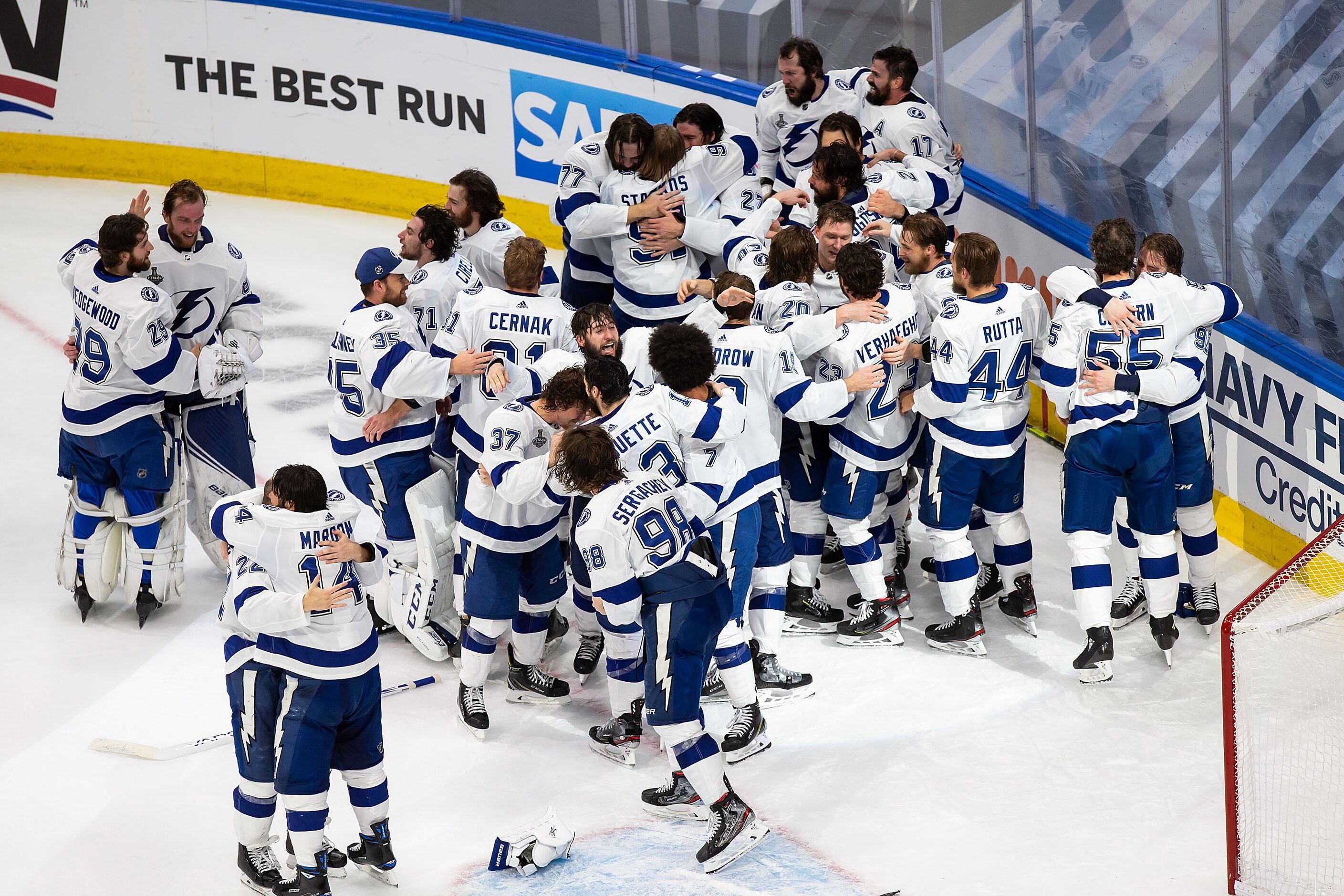 The Tampa Bay Lightning react to their victory against the Dallas Stars during Game Six of...