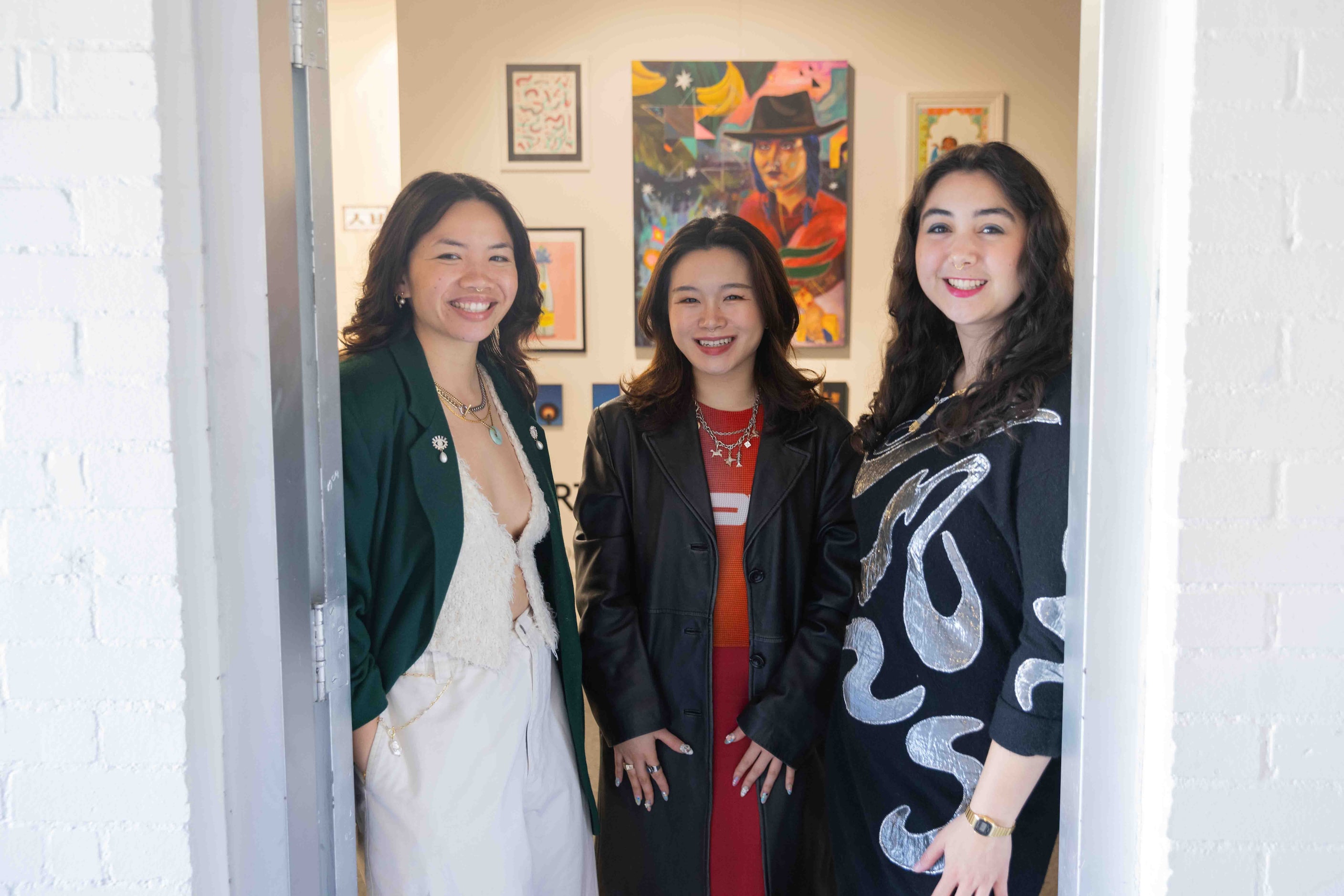 (From left) Co-curators Jackie Tao Law, Christina J. Hahn, founder of the Dallas Asian...