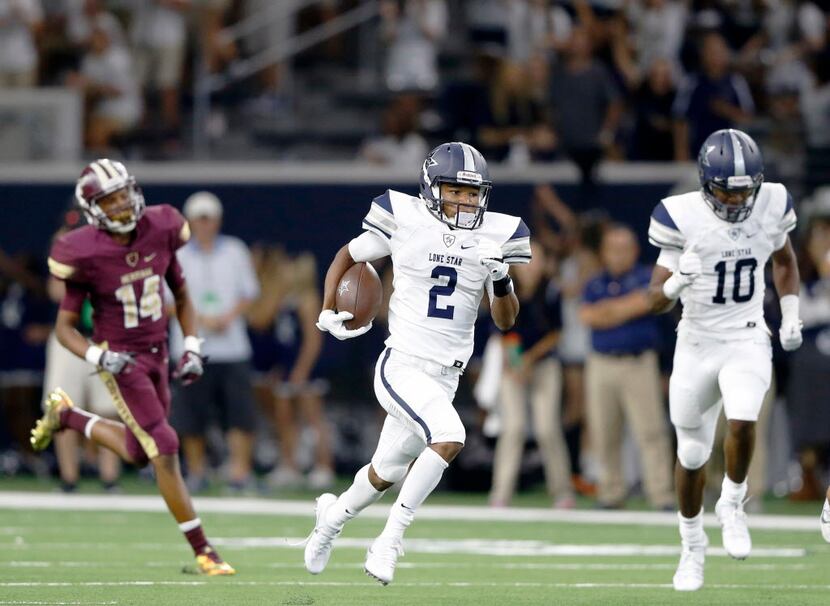 Lone Star's Jaylen Dixon (2) runs up the field for a touchdown in a game against Heritage...