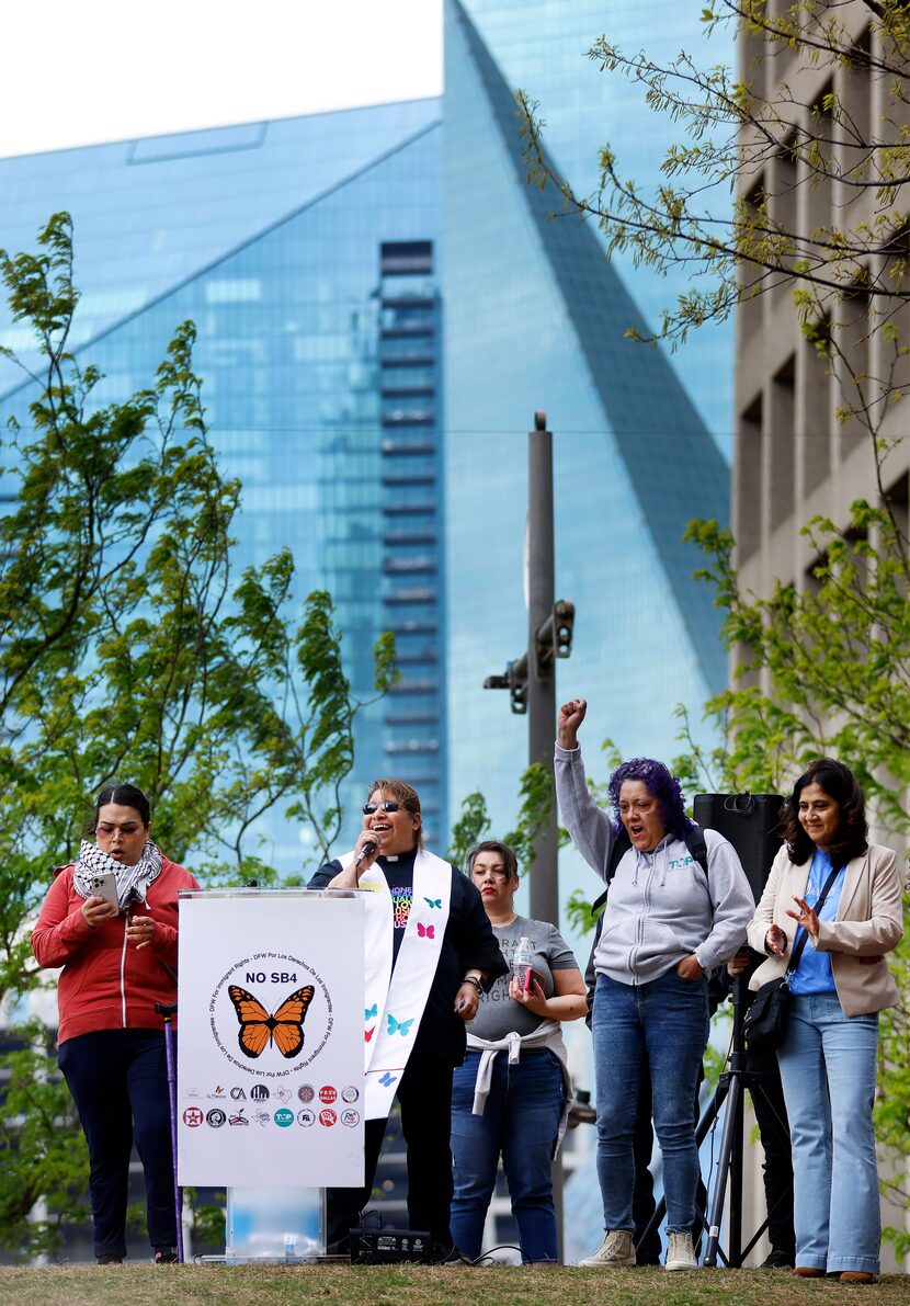 Oak Lawn United Methodist Church Associate Pastor Isabel Márquez (on microphone) speaks at...