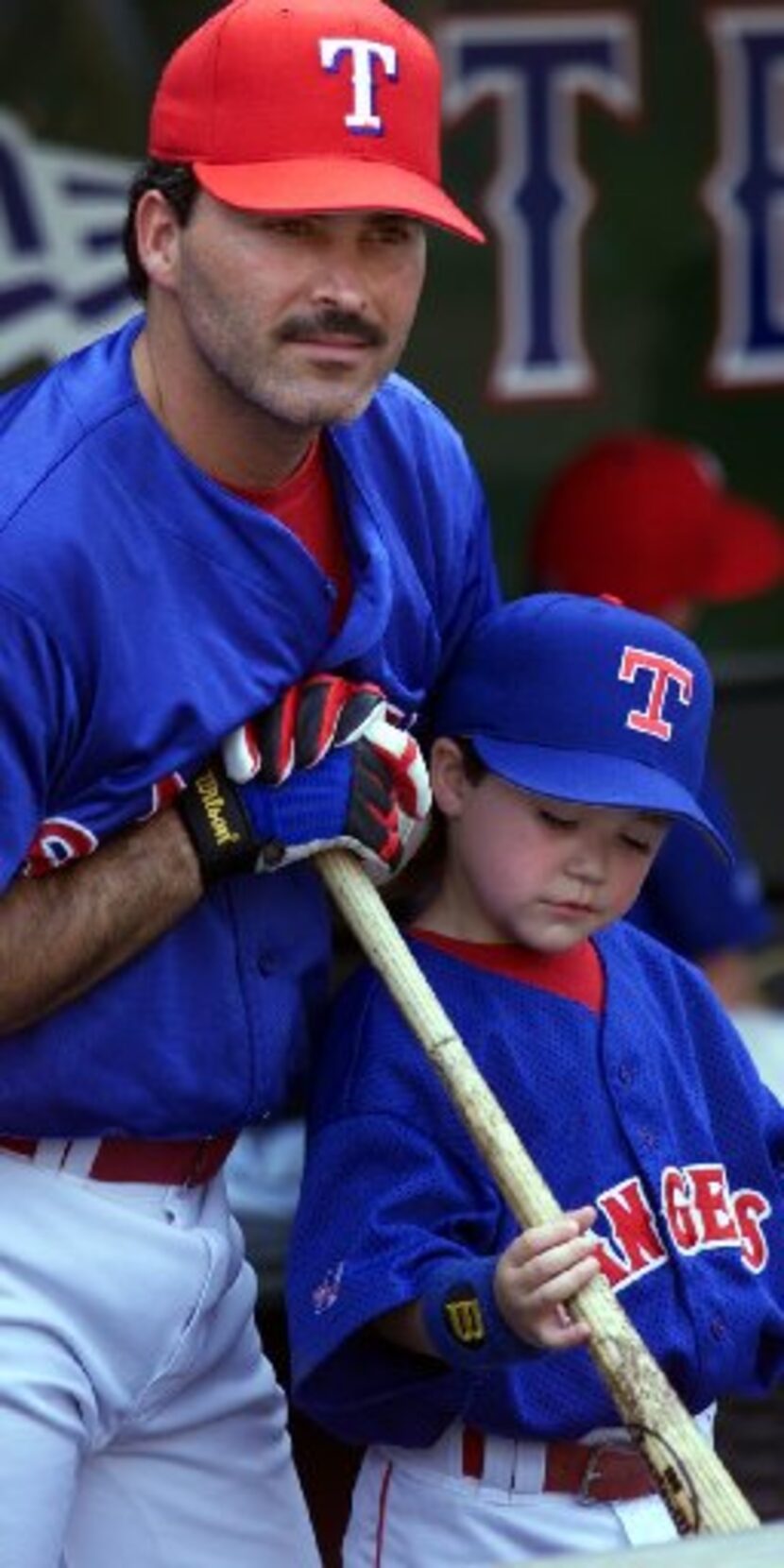 ORG XMIT: S11AB4C33 Texas Rangers first baseman Rafael Palmeiro watches batting practice...