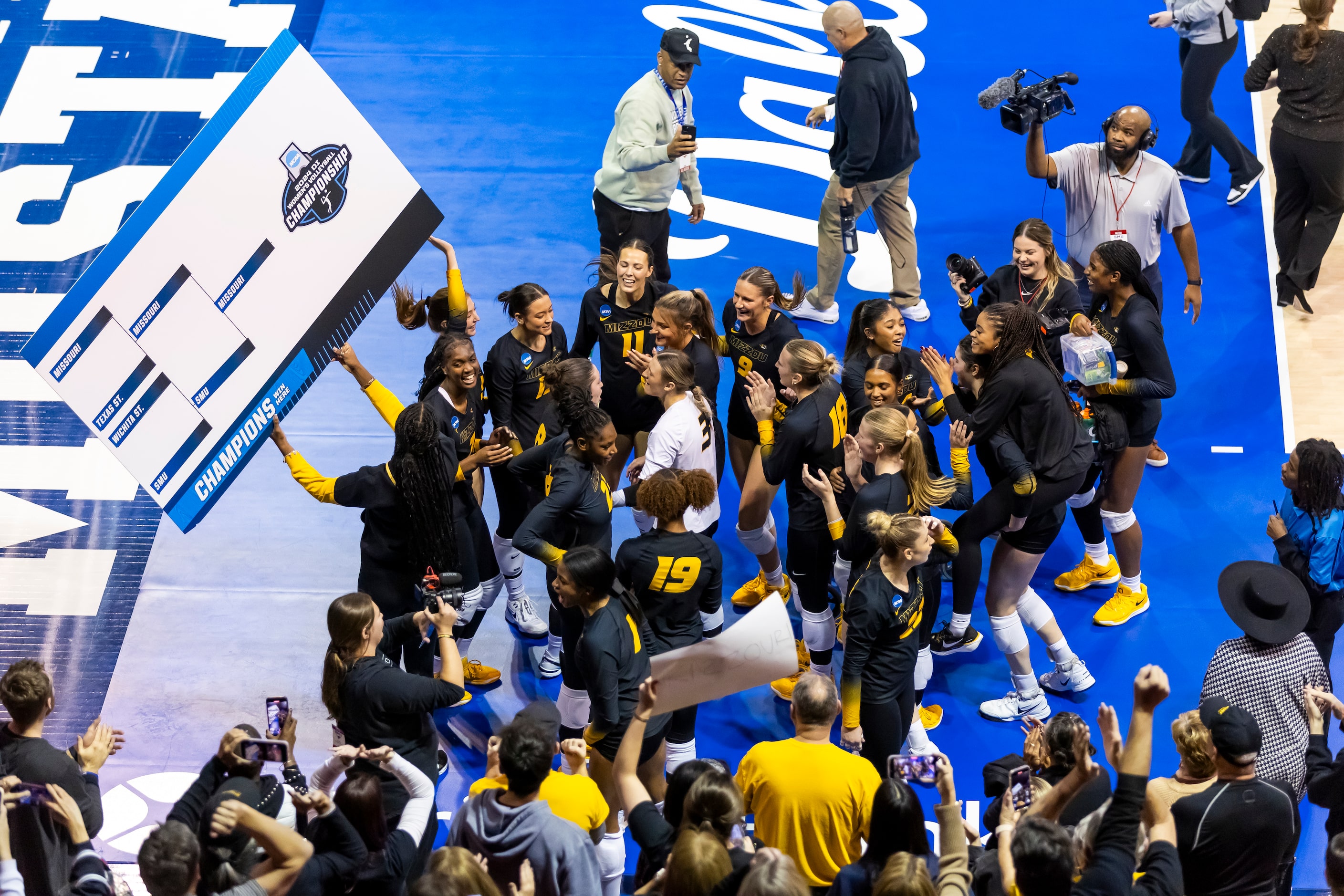 Missouri celebrates beating SMU in four sets in an NCAA college volleyball game at SMU in...