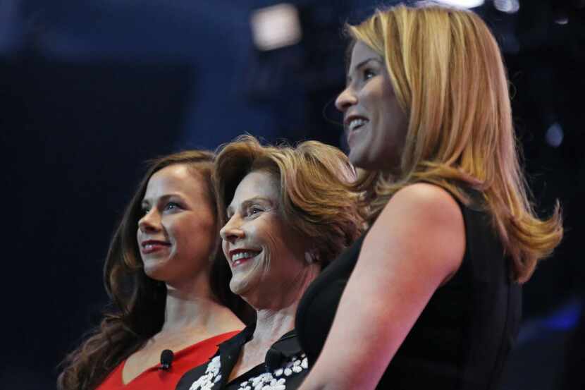 Former First Lady Laura Bush, center, and daughters Jenna Bush Hager,right, and Barbara...