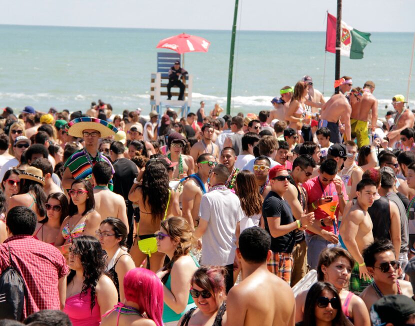 So big are the college crowds at South Padre Island's Spring Break that the lifeguards turn...