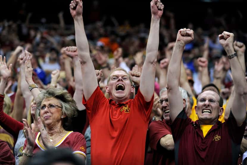 KANSAS CITY, MO - MARCH 12: Fans react after the Iowa State Cyclones beat the Texas...
