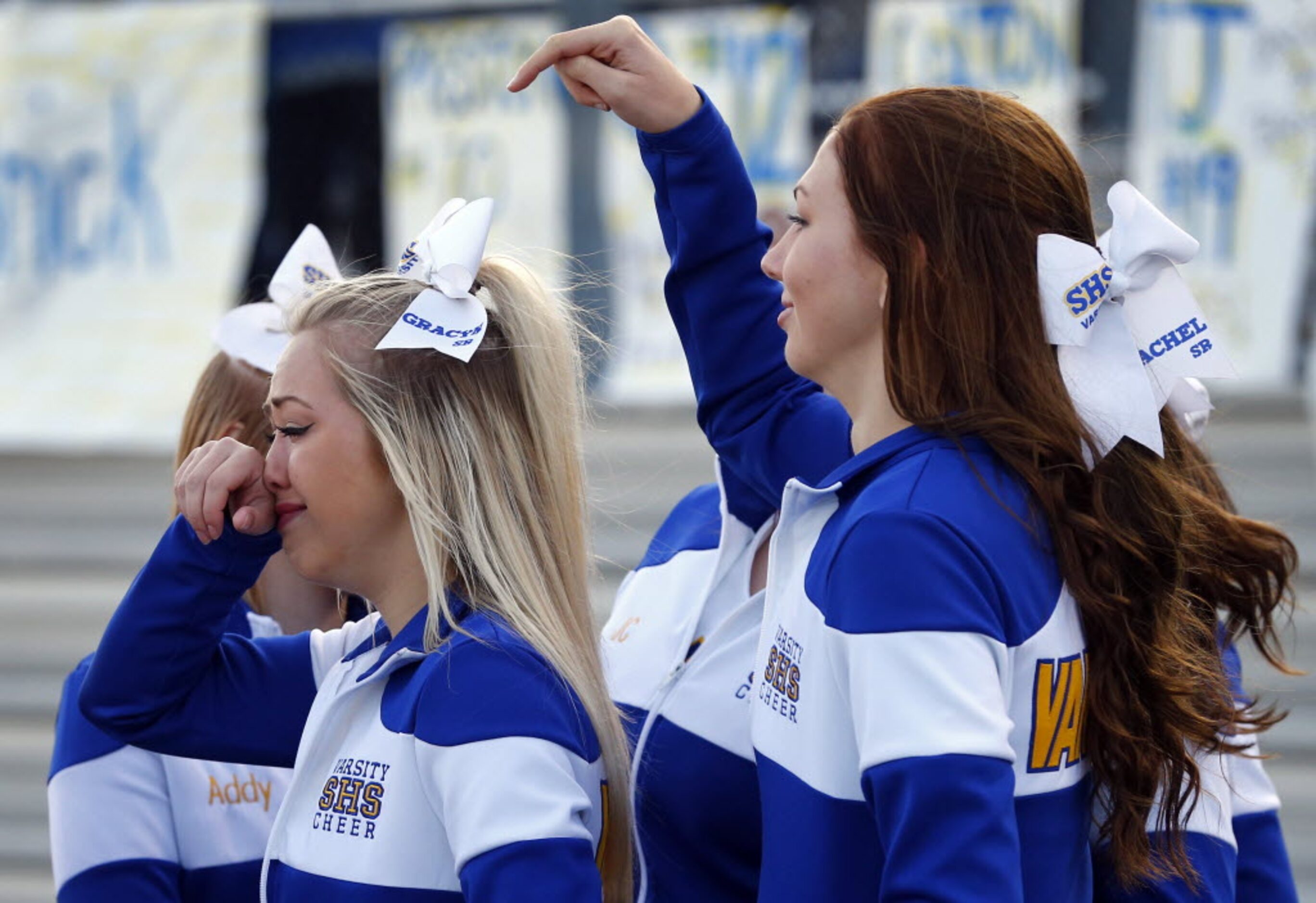 TXHSFB Sunnyvale cheerleader Gracyn Davis, on left, is overcome with emotion following their...