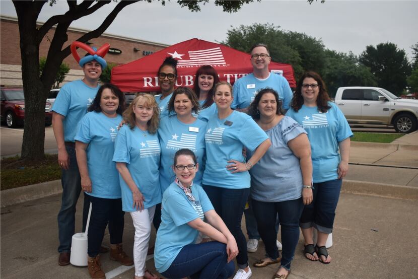 Republic Title of Texas workers from its Frisco office posed for a photo during a party.