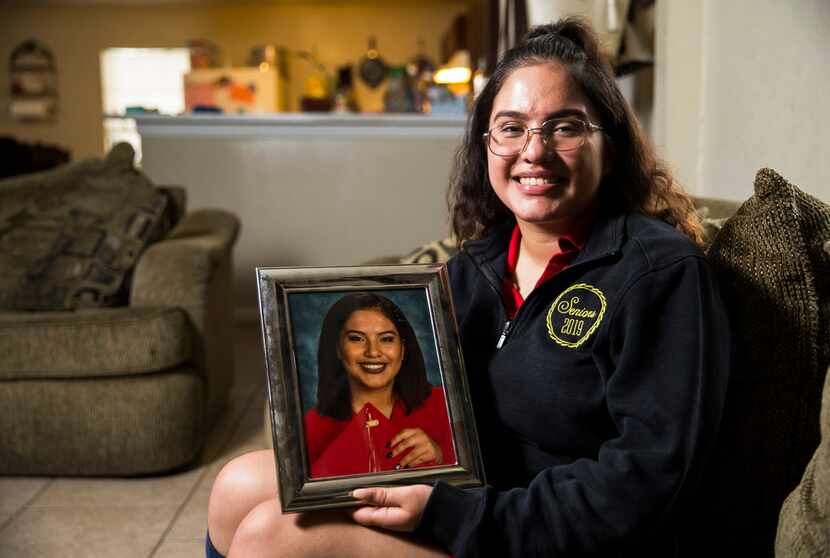 Dreamer Judith Juarez, a senior at Irma L. Rangel Young Women's Leadership School, holds her...