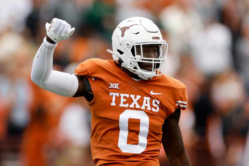 DeMarvion Overshown #0 of the Texas Longhorns reacts in the first quarter against the Baylor...