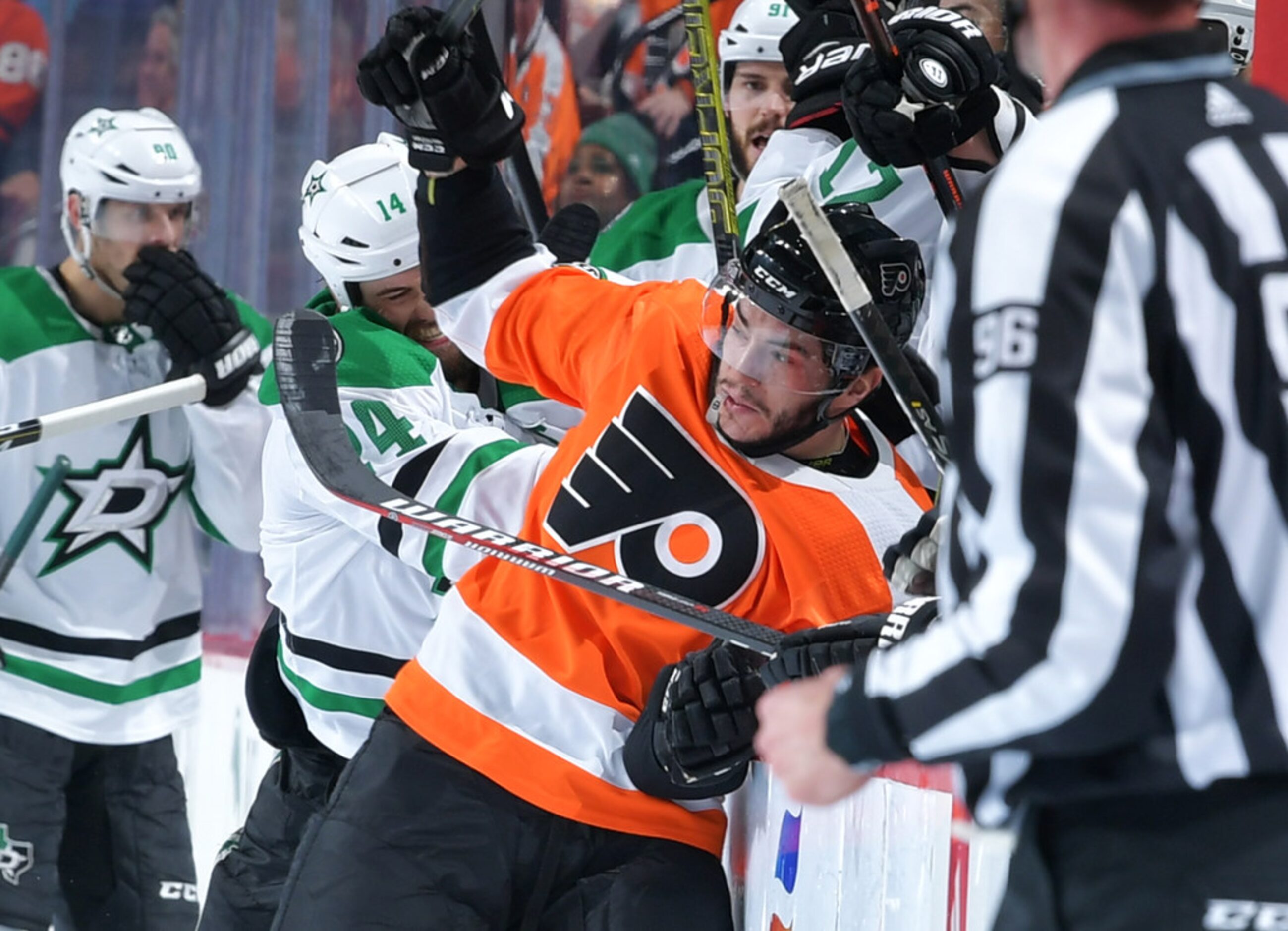 PHILADELPHIA, PENNSYLVANIA - JANUARY 10: Jamie Benn #14 of the Dallas Stars checks Phil...