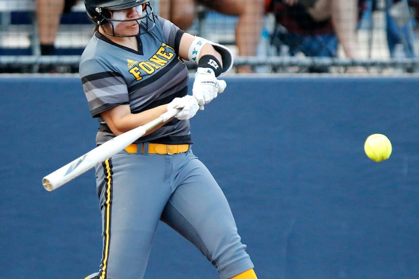 Forney's Trinity Cannon makes contact in the second inning of a 13-2 win over McKinney North...