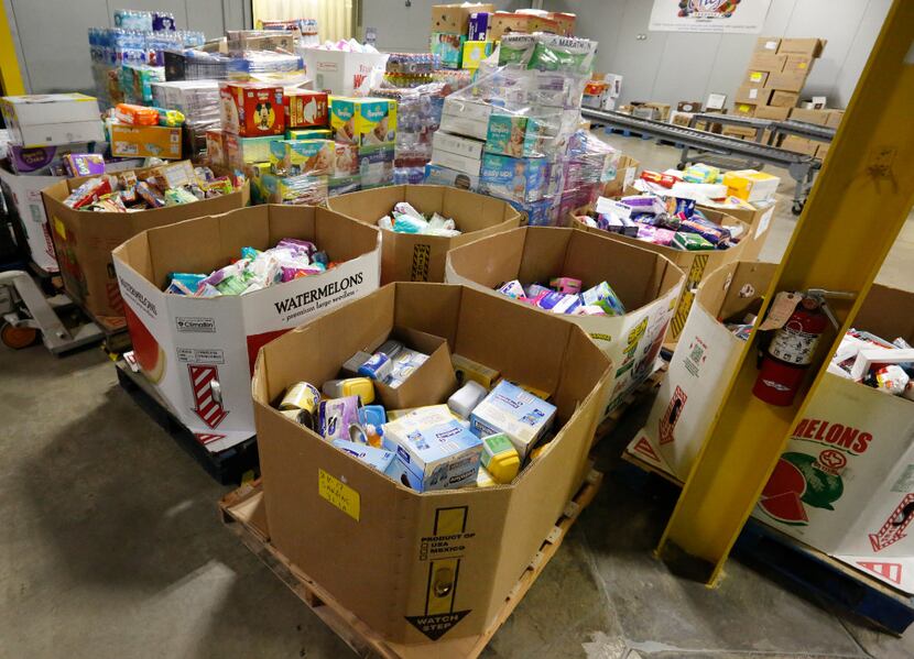 Chefs' Produce staff prepares donations at the company's Dallas warehouse on Sept. 1.