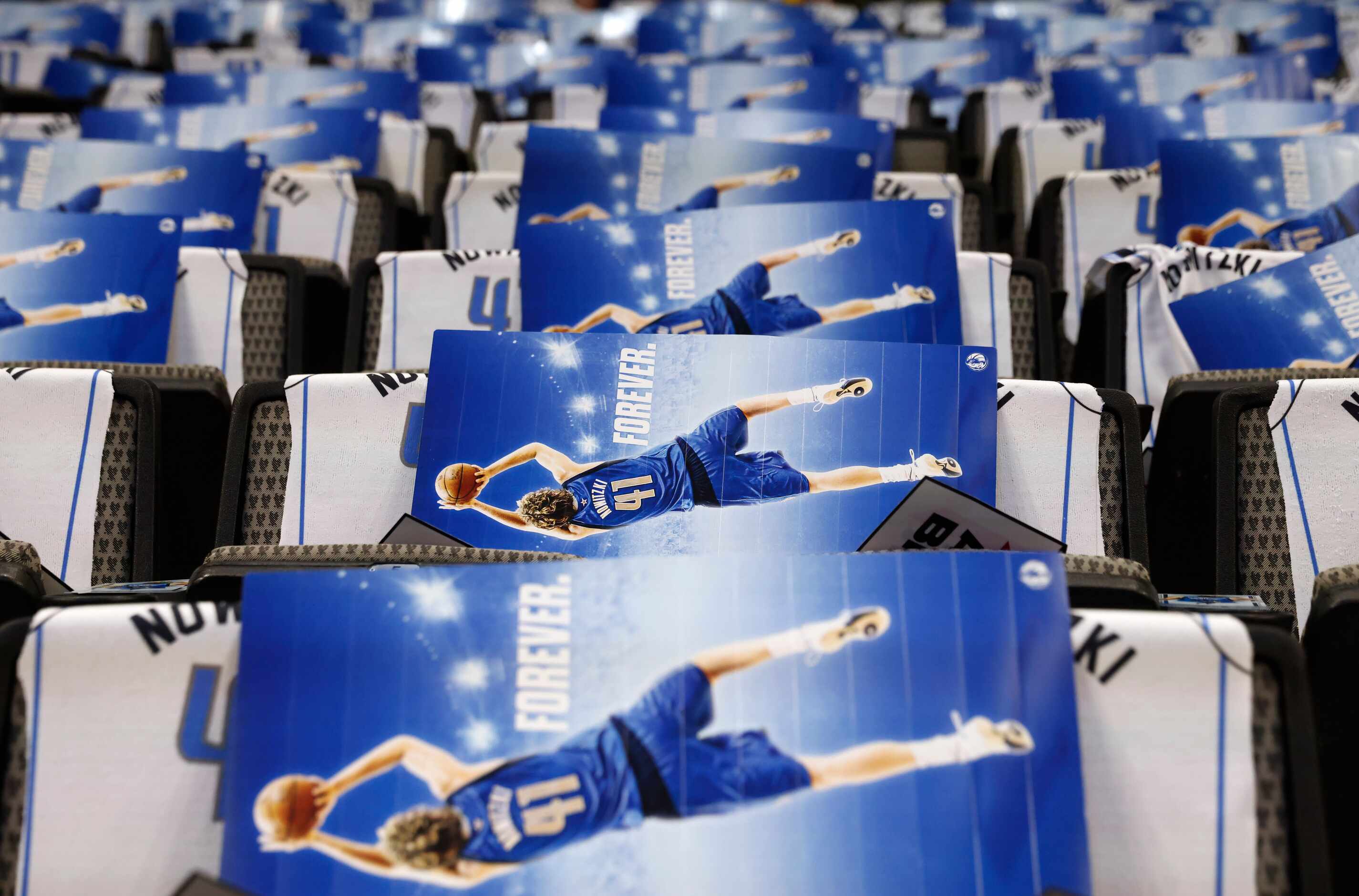 Dallas Mavericks Dirk Nowitzki memorabilia lines the seats prior to a game against the...