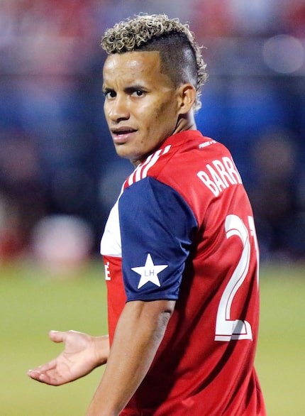 FC Dallas midfielder Michael Barrios (21) questions an officials call during the first half...