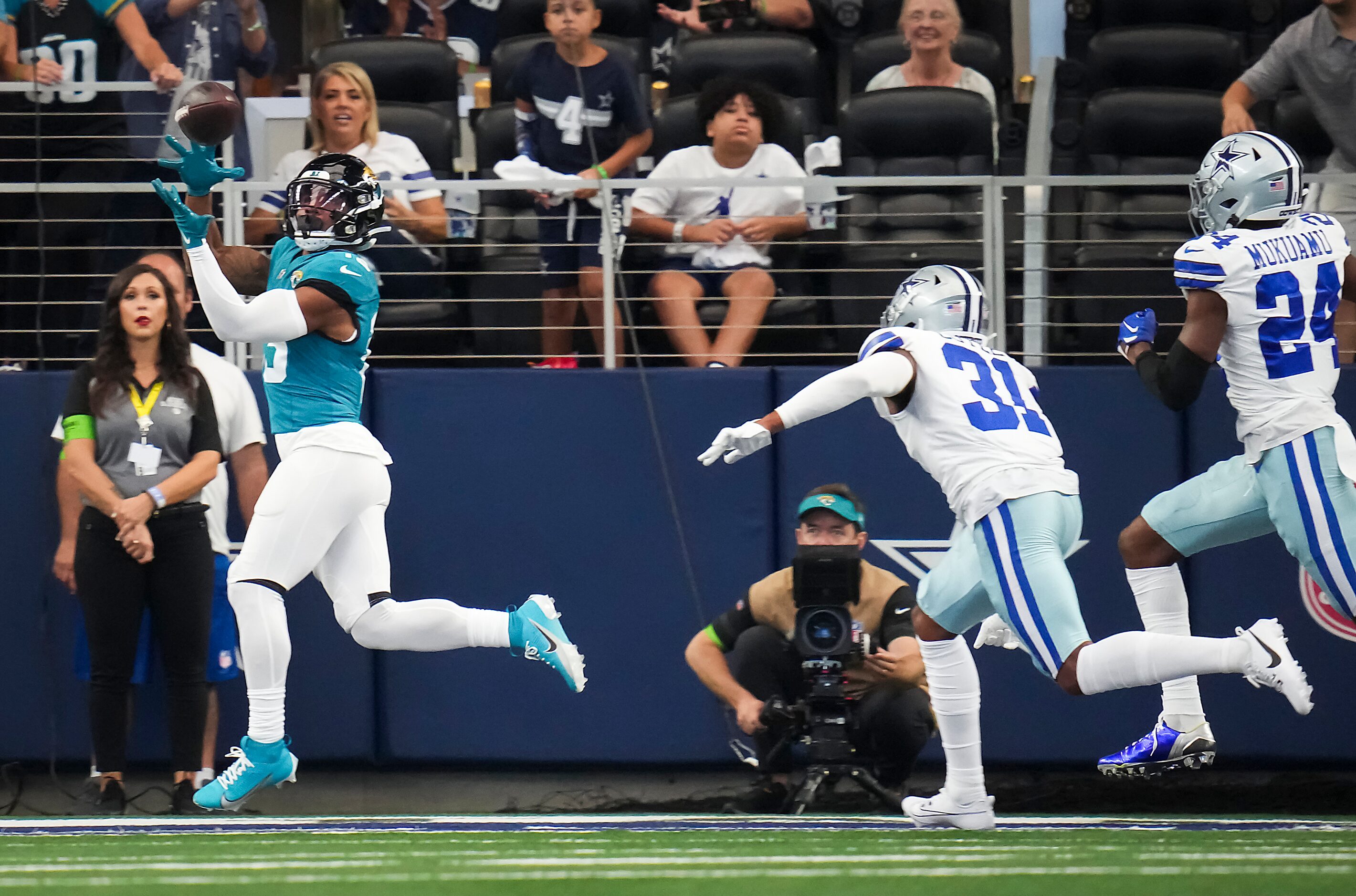 Jacksonville Jaguars wide receiver Christian Kirk (13) catches a touchdown [ass as Dallas...