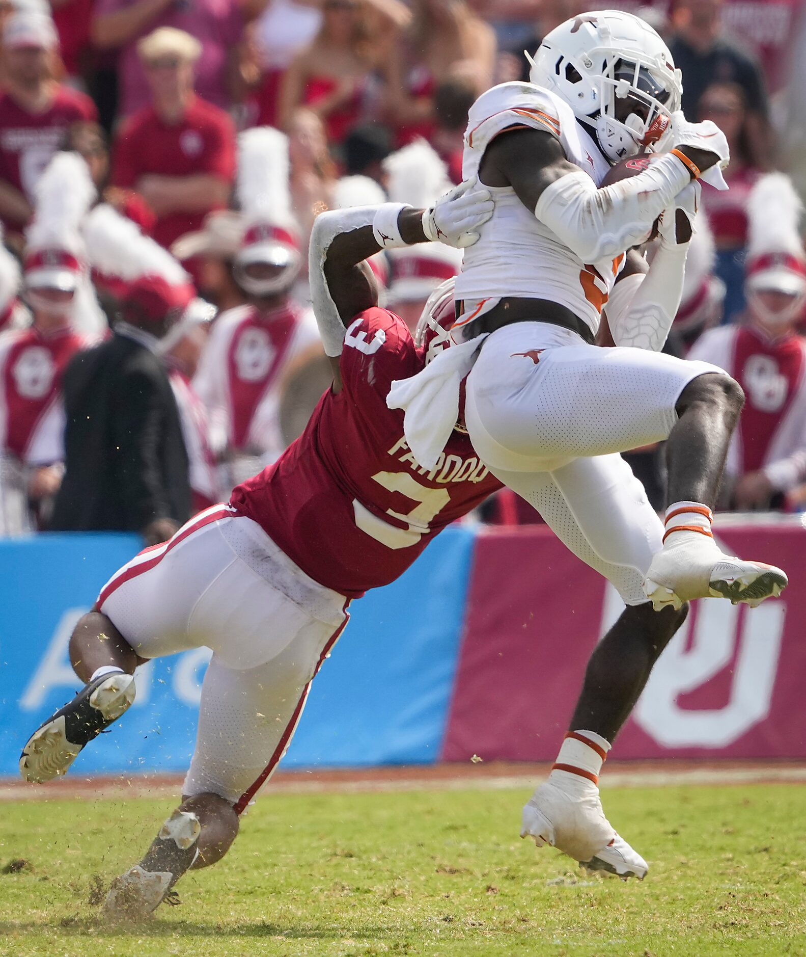 Texas defensive back D'Shawn Jamison (5) intercepts a pass intended for Oklahoma wide...