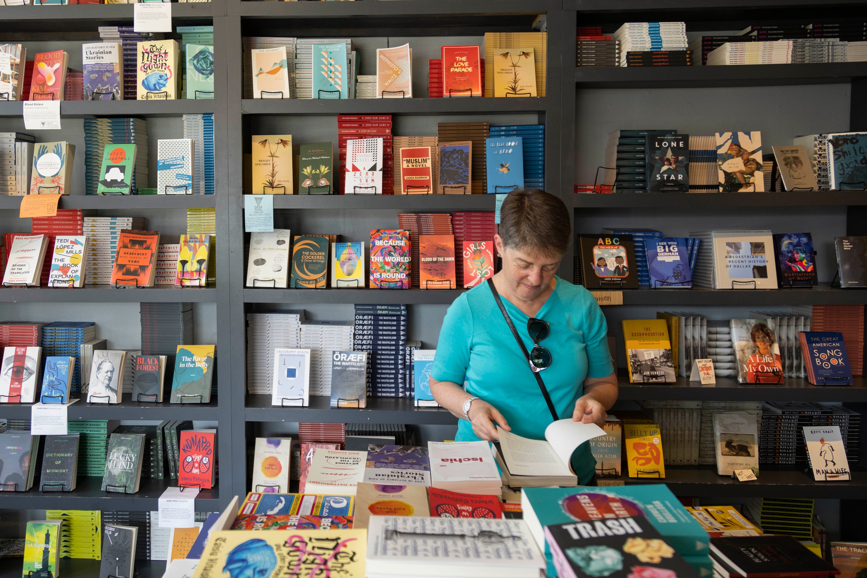 Lora Wildenthal of Houston browses the books at Deep Vellum Bookstore & Publishing Co. in...