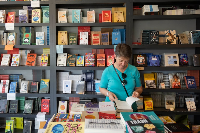 Lora Wildenthal of Houston browses the books at Deep Vellum Bookstore & Publishing Co. in...