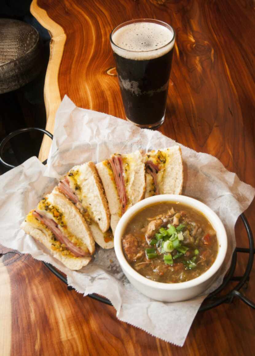Chicken-andouille gumbo, with a muffaleta sandwich with a root beer at Alligator Cafe in the...