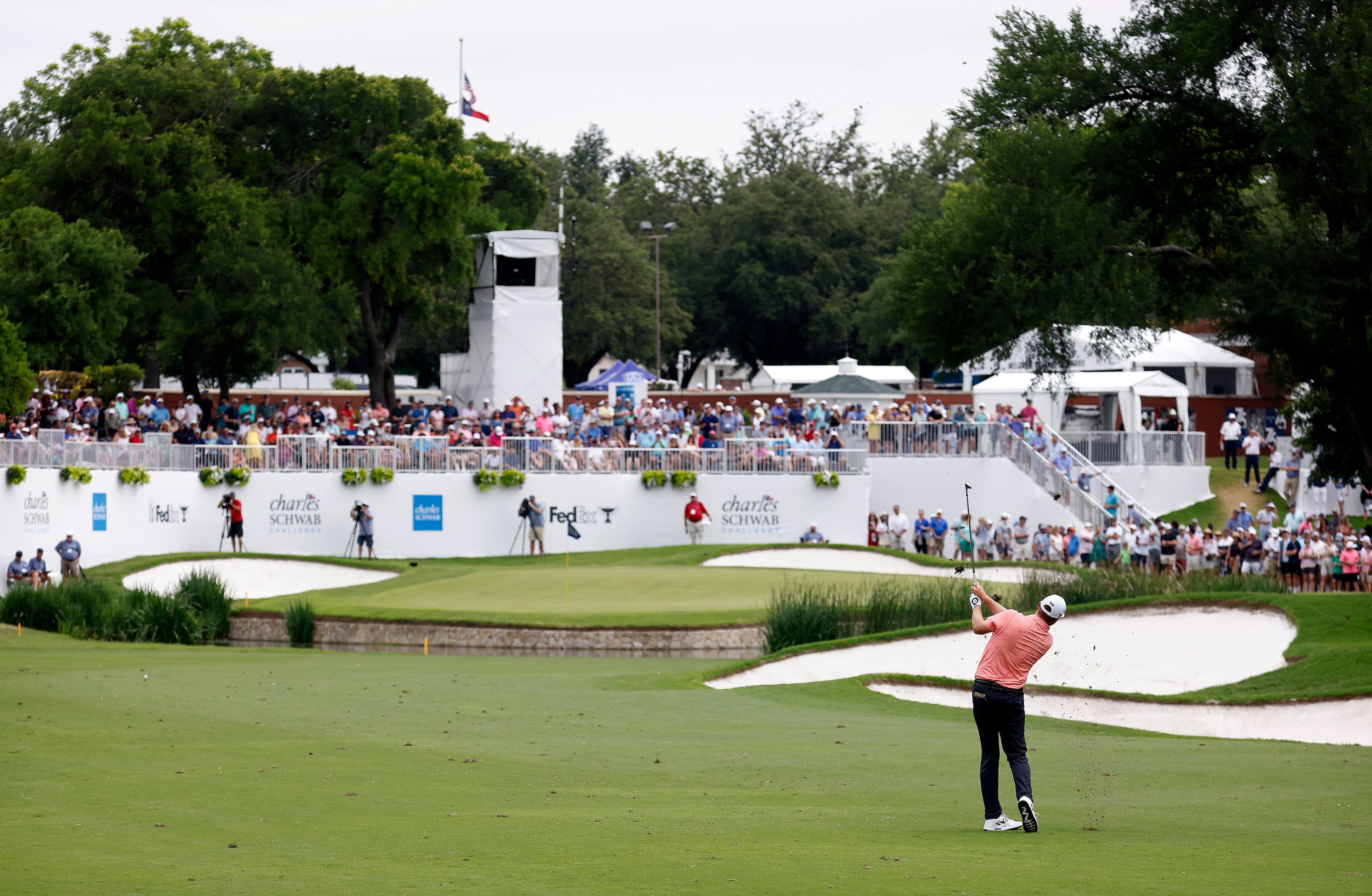 Professional golfer Jason Kokrak makes his approach shot on the picturesque No. 9 during the...