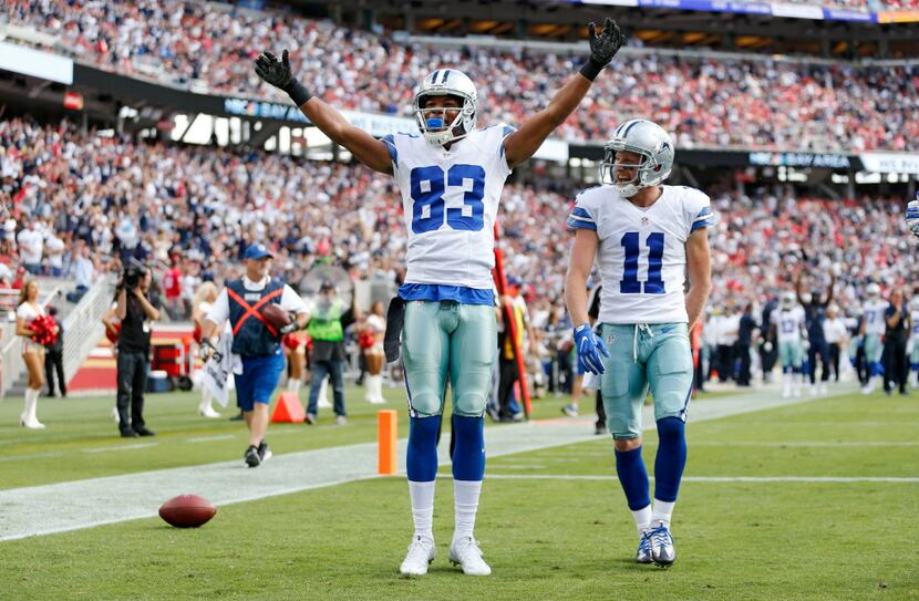 Dallas Cowboys wide receiver Terrance Williams (83) celebrates after scoring a touchdown in...