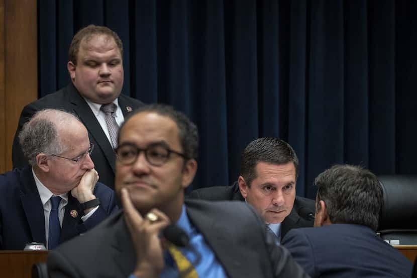 Rep. Mike Conway, R-Midland (left) and Rep. Will Hurd, R-San Antonio (foreground) during a...