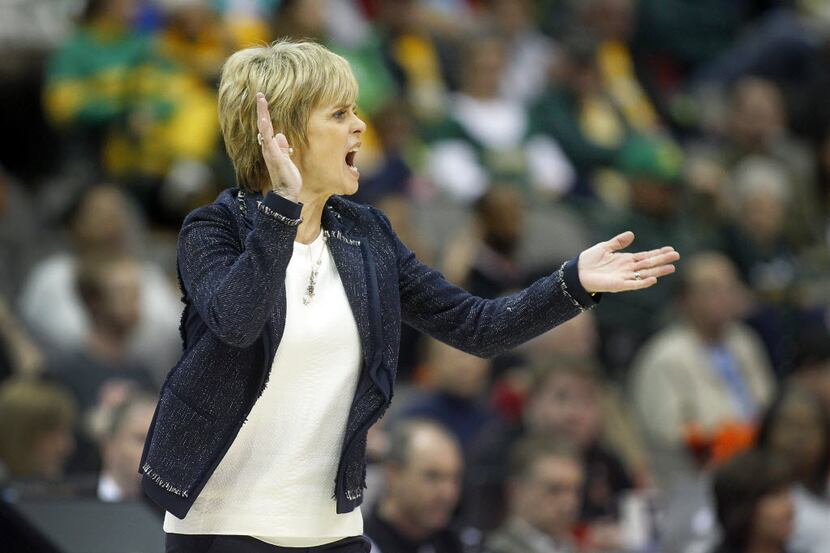 Baylor Bears head coach Kim Mulkey applauds her teams play against the Oklahoma State...