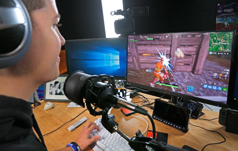 Preston Arsement plays Fortnite in his studio.