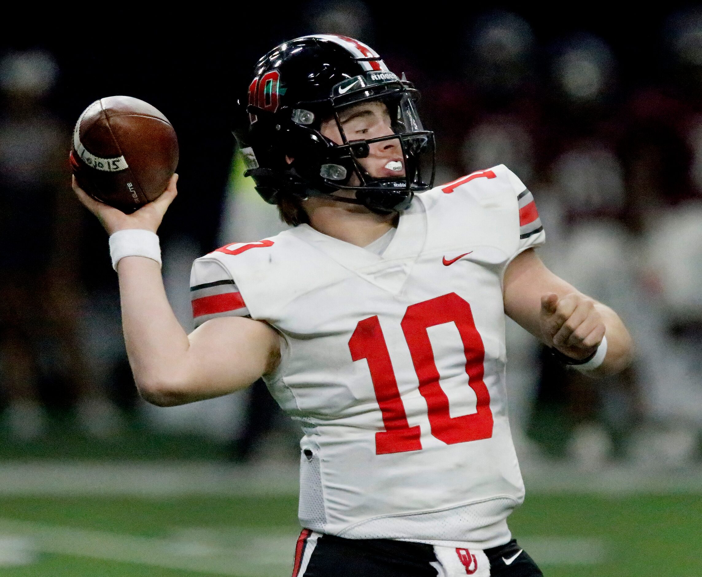 Lovejoy High School quarterback Alexander Franklin (10) throws a pass during the first half...