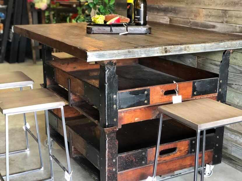 Boxcar House in Frisco   which sells handcrafted furniture from old train car materials,...