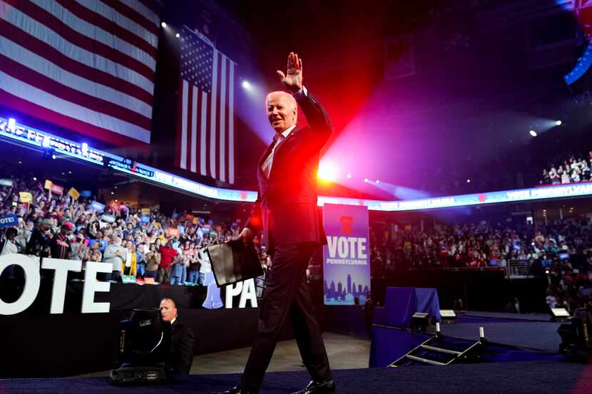 President Joe Biden waves after speaking at a campaign rally for Pennsylvania's Democratic...