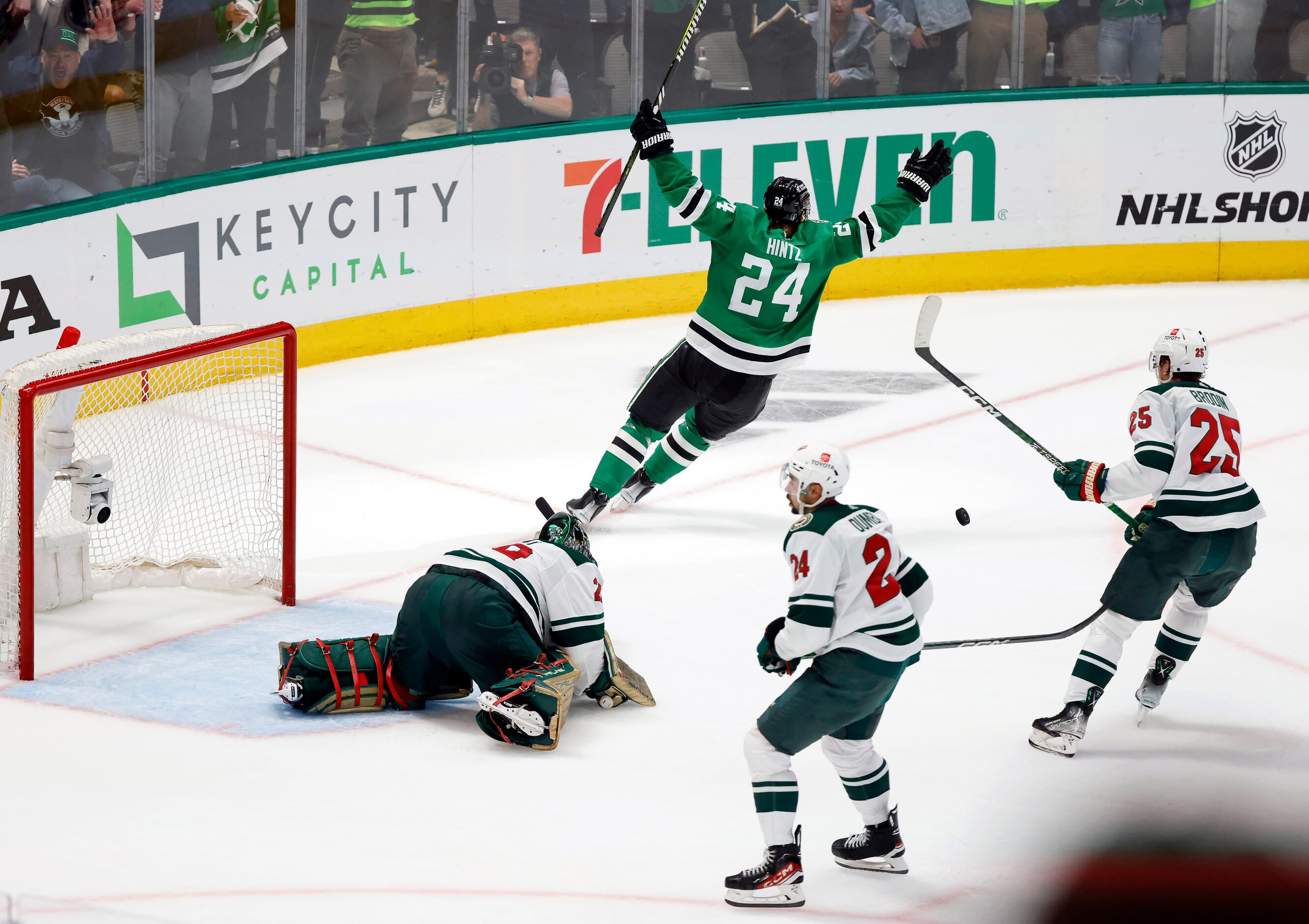 Dallas Stars center Roope Hintz (24) celebrates his second period goal against Minnesota...