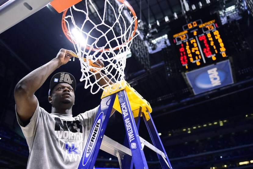 Mar 30, 2014; Indianapolis, IN, USA; Kentucky Wildcats forward Julius Randle cuts down a...