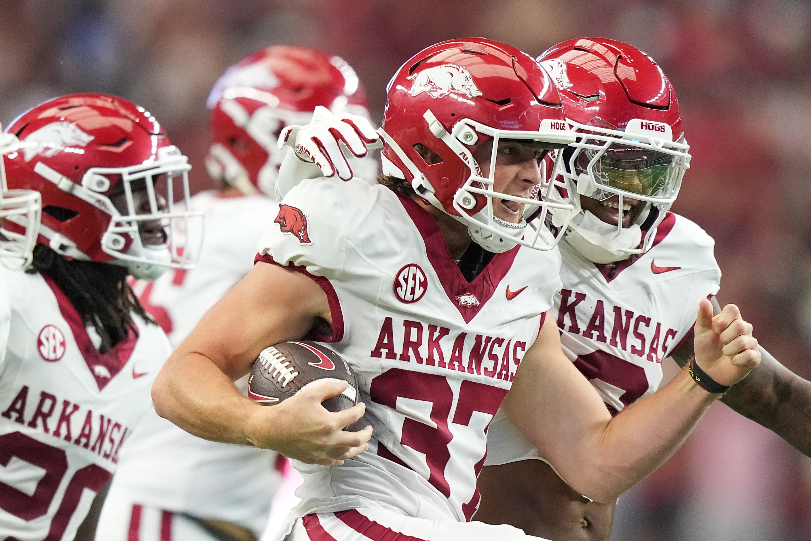 Arkansas punter Devin Bale (37) celebrates after he picked up a first down on fake punt...