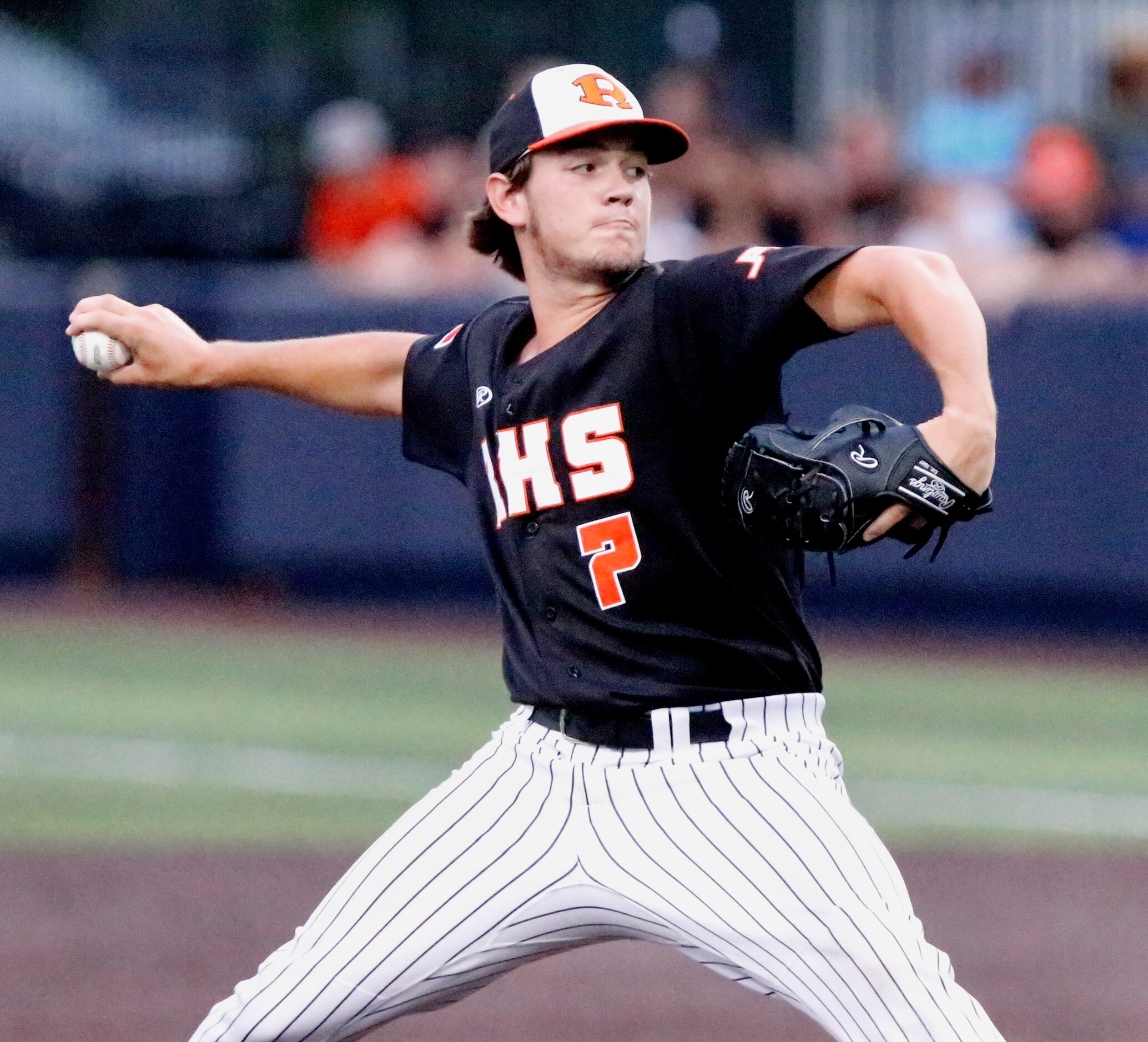 Rockwall pitcher Daniel Cunningham (7) throws a pitch in the third inning as Rockwall Heath...